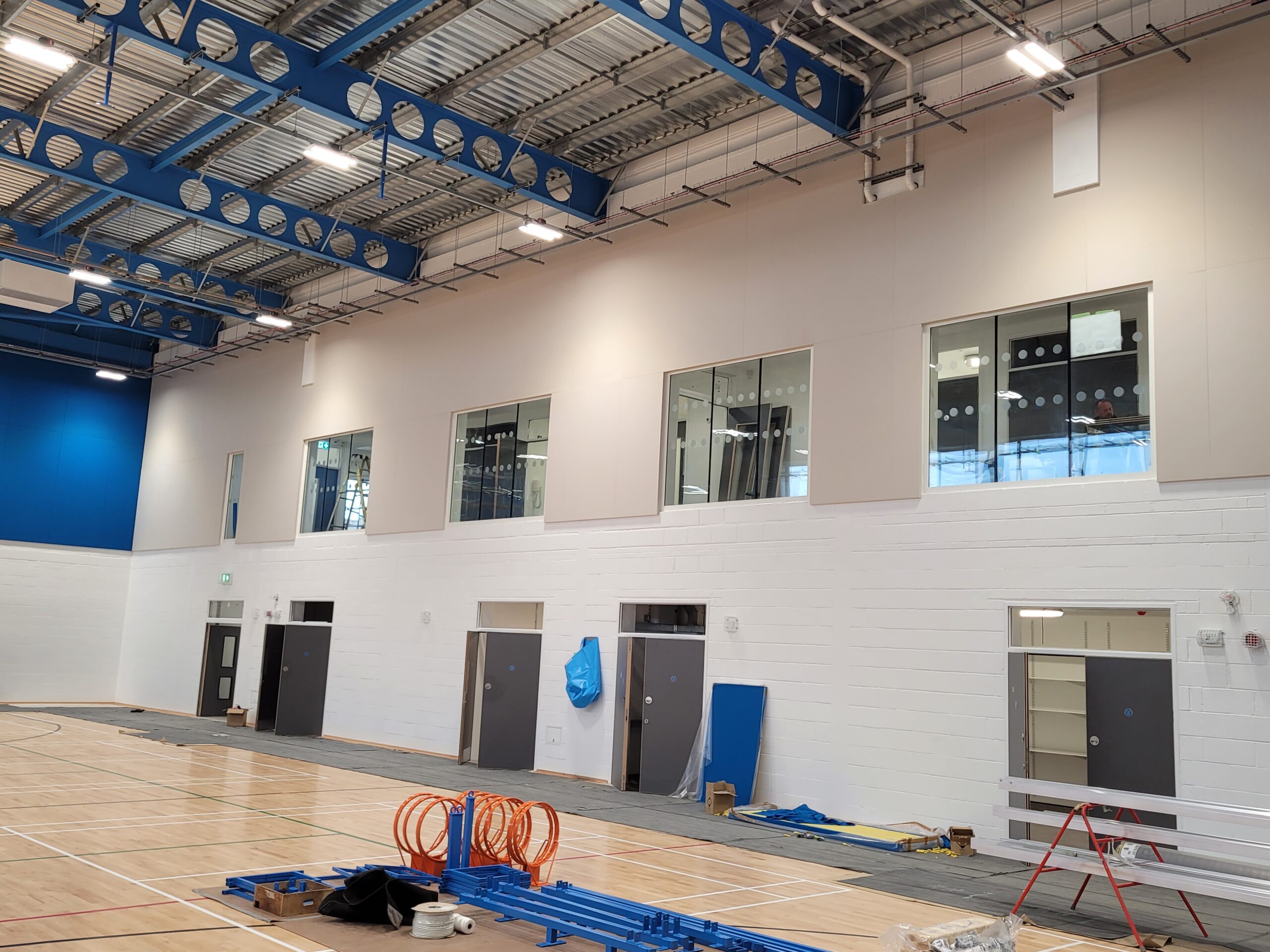 New acoustic walls fitted in a sports hall.